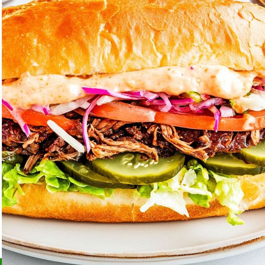 Mexican roast beef birria sandwich with pepper jack and pickled jalapenos