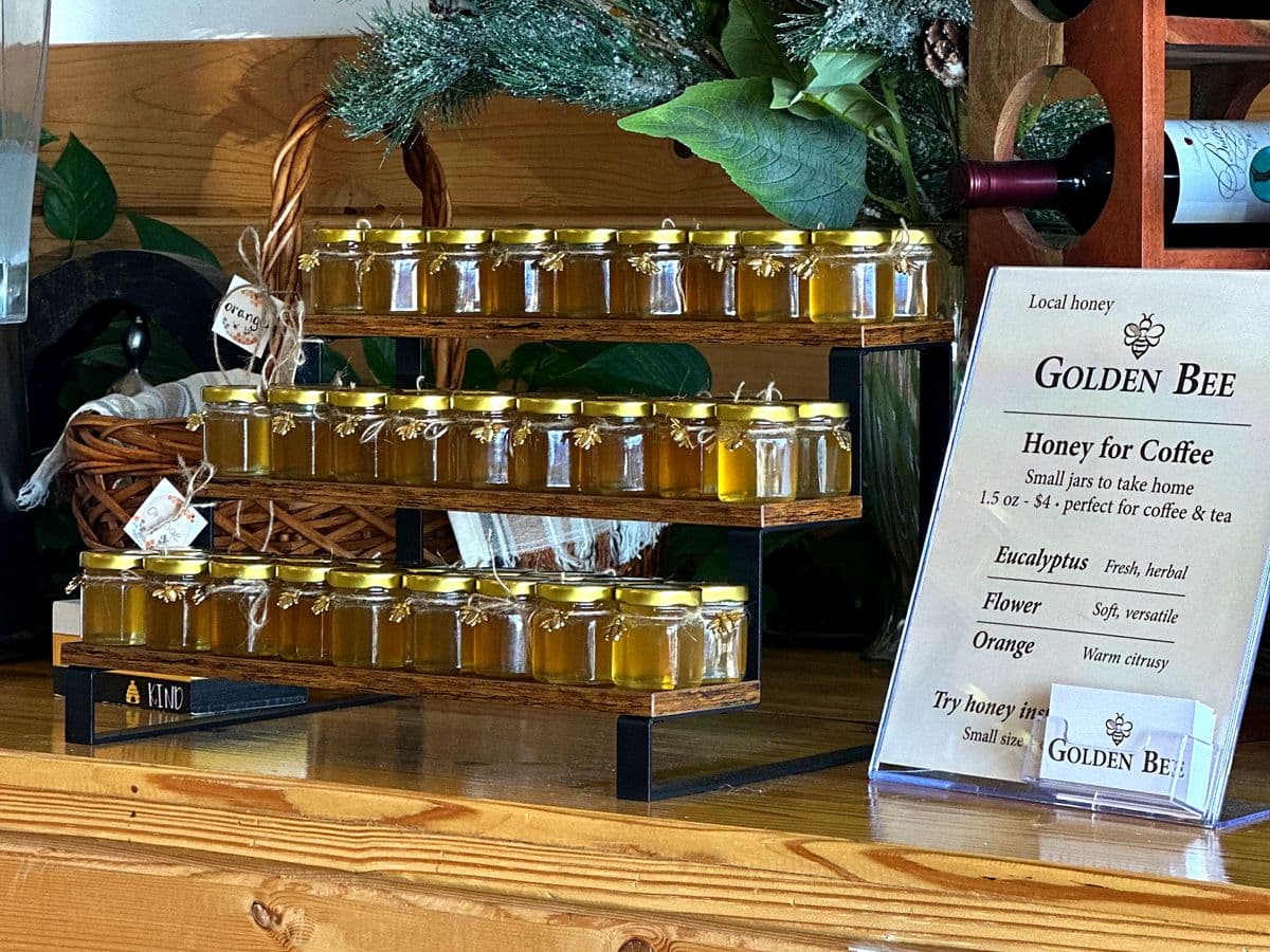 Jars of raw local honey from nearby Sacramento beekeepers for sale at Cafe 33